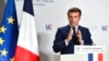 French President Emmanuel Macron speaks during a media conference after an EU summit in Brussels, March 25, 2022. 